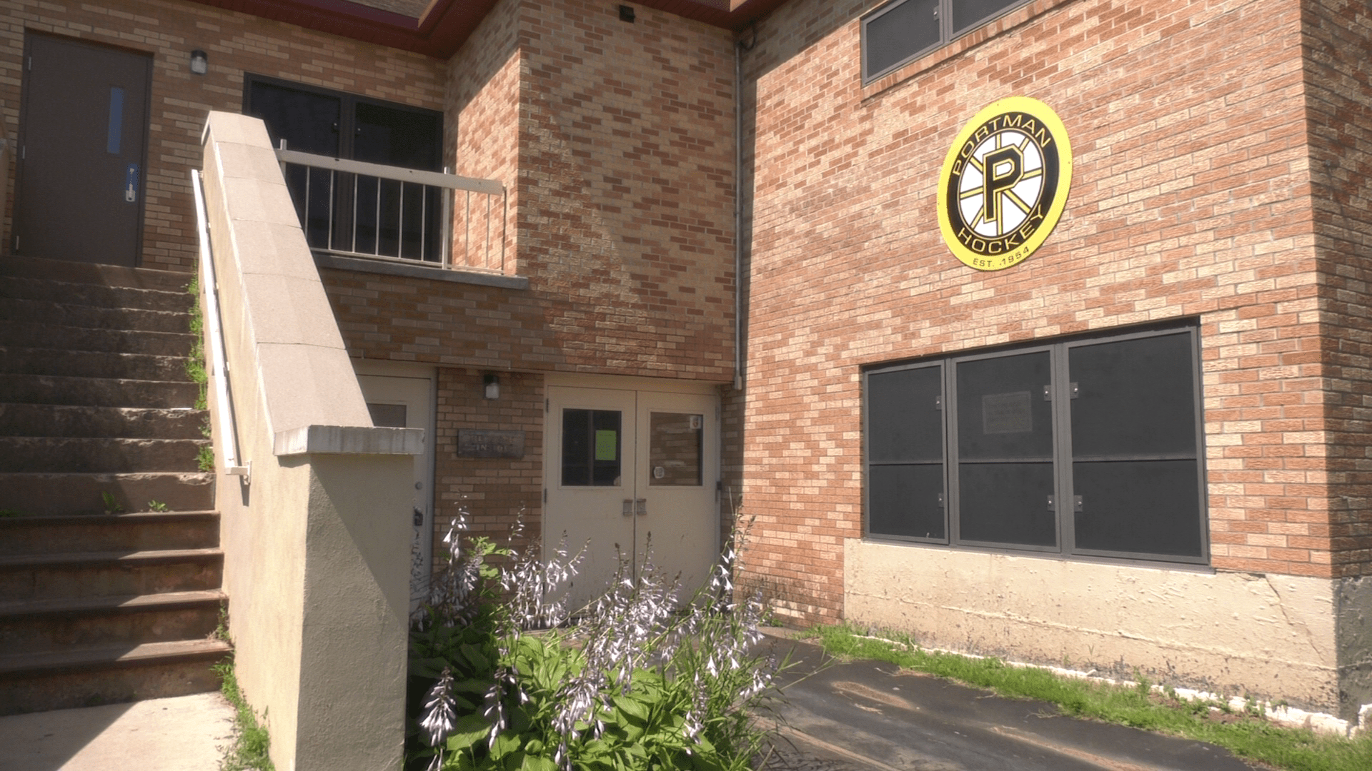 A picture of Portman hockey sign on a building