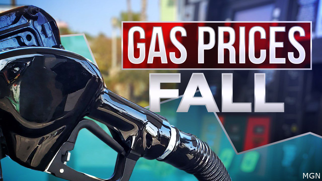 close-up of gas pump with "gas prices fall" next to it