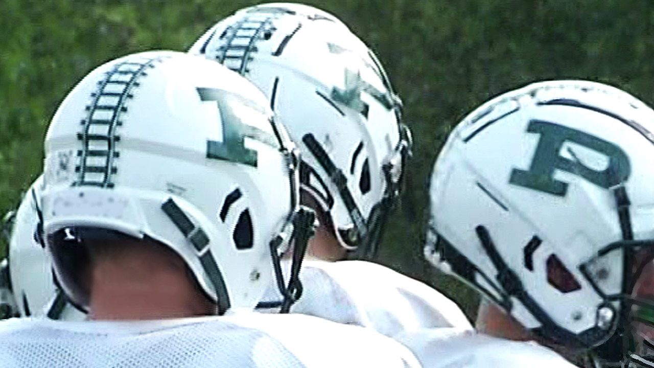 Screengrab of Proctor football helmets