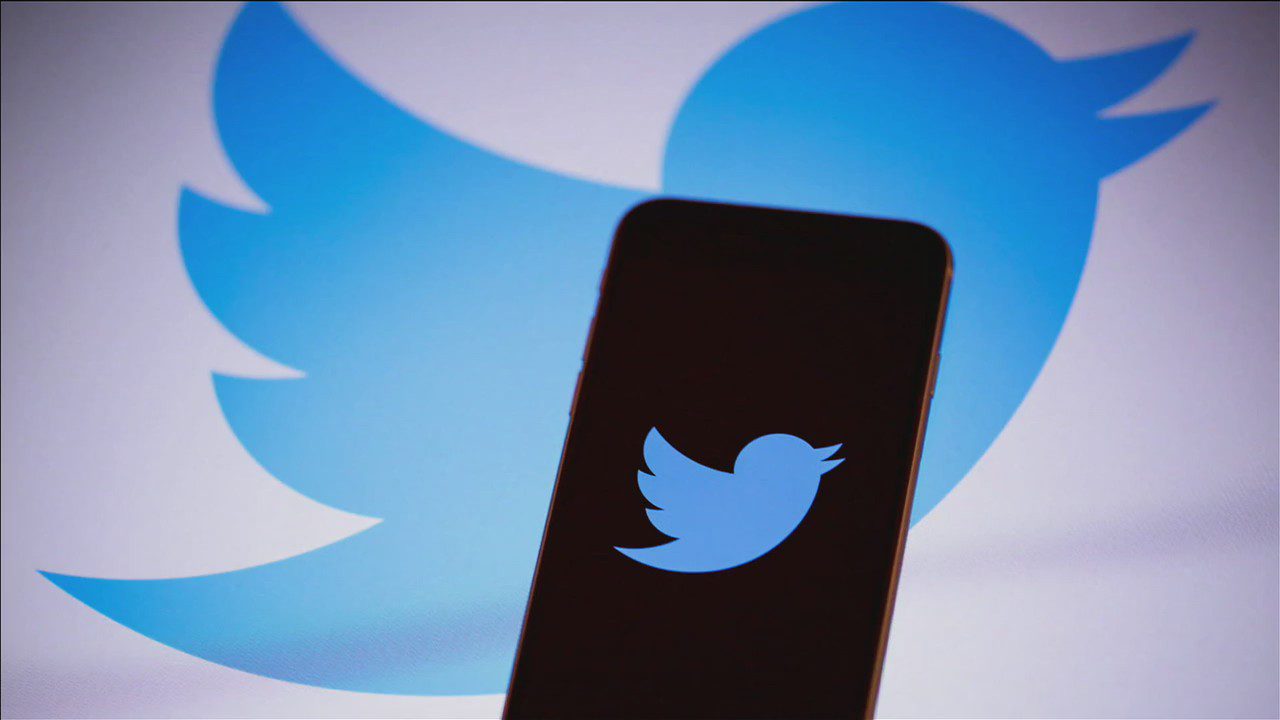 Twitter's logo on a phone screen