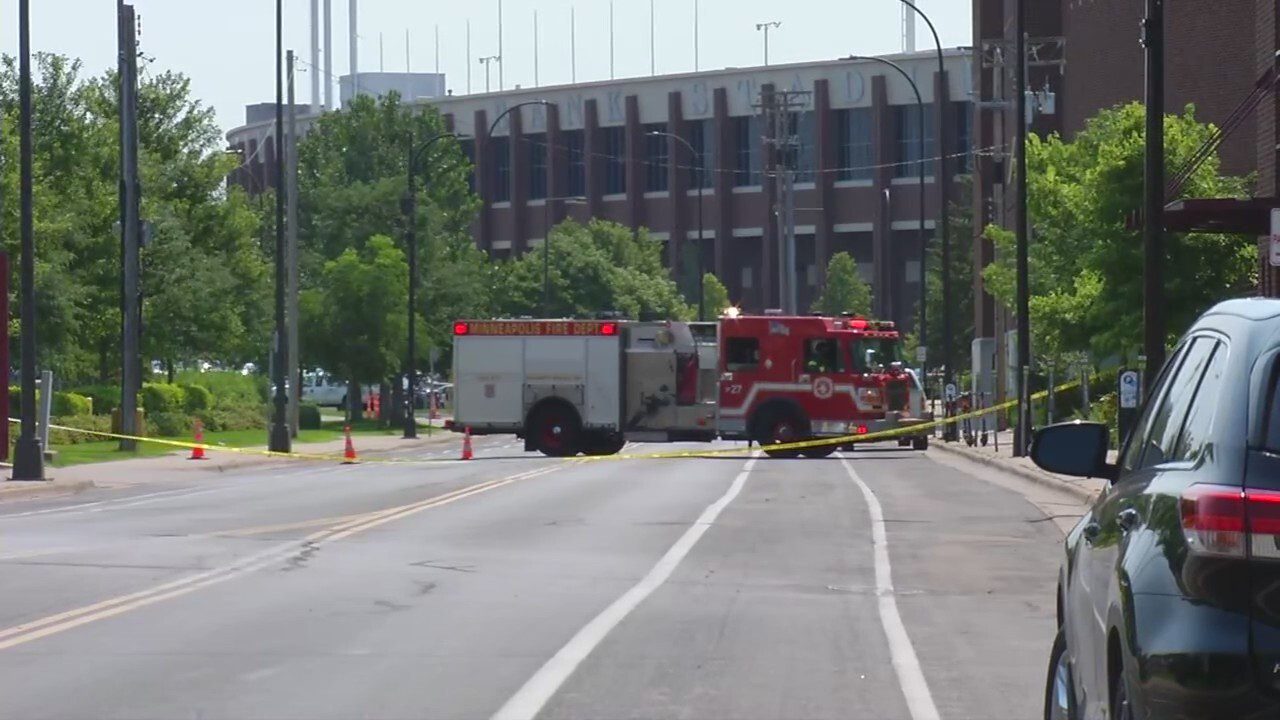 A fire truck blocks a road on the University of Minnesota campus.