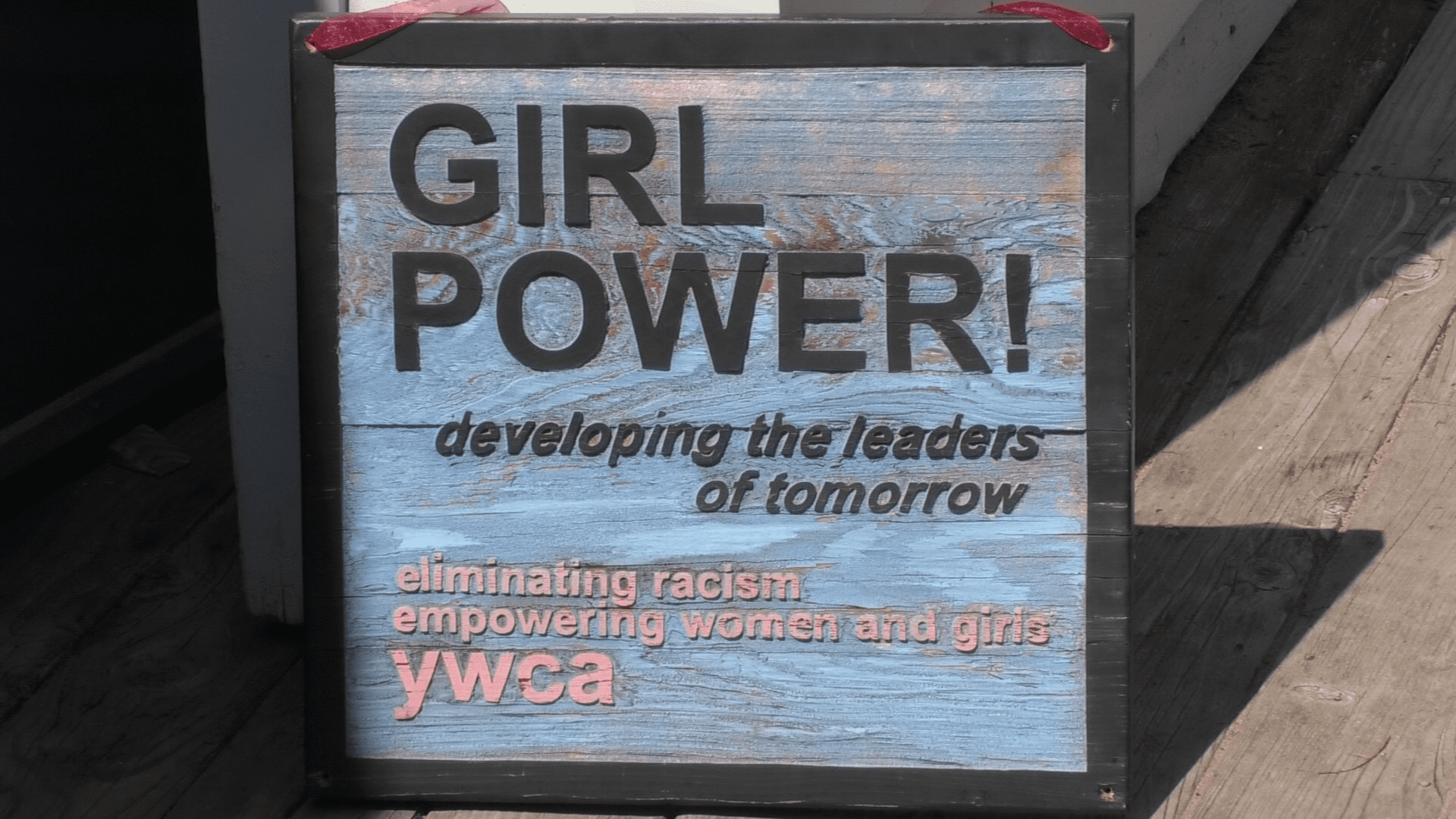 A sign with the writing Girl Power on it