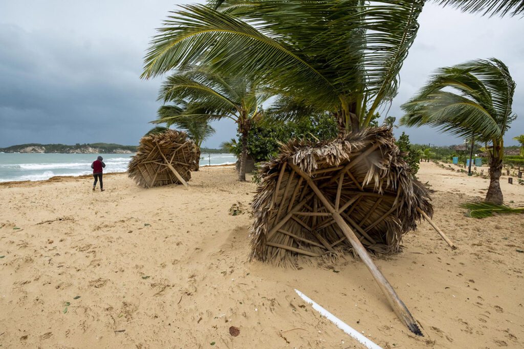 Broken umbrellas on beach in Punta Cana