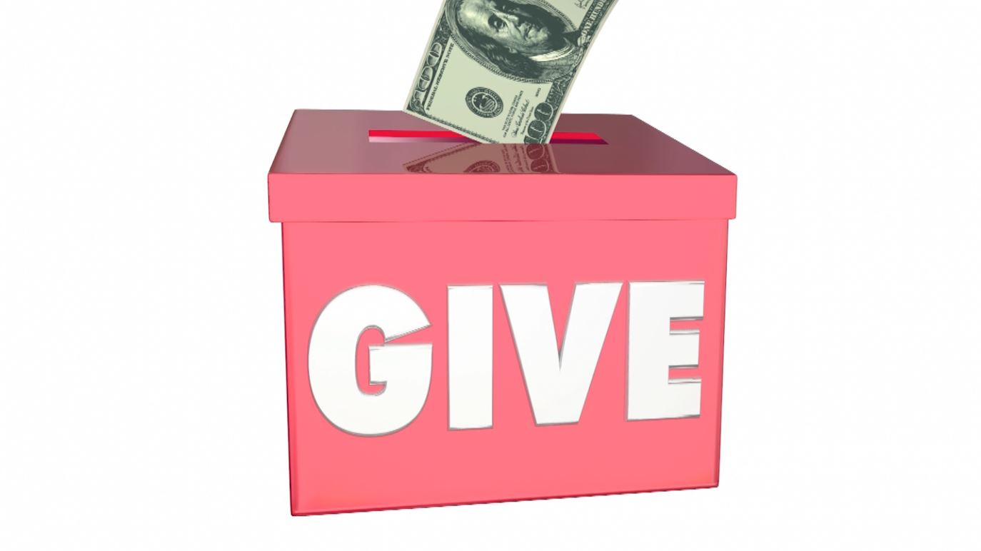 A bill going into a Give bucket