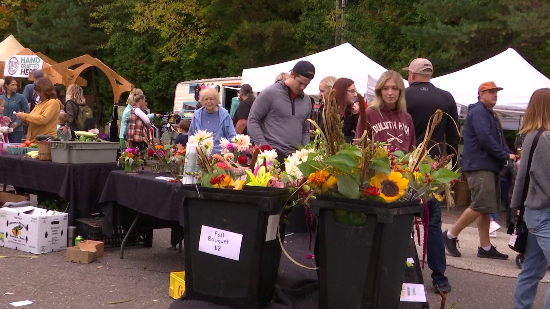 People shopping the vendors at Chester Bowl Fall Fest