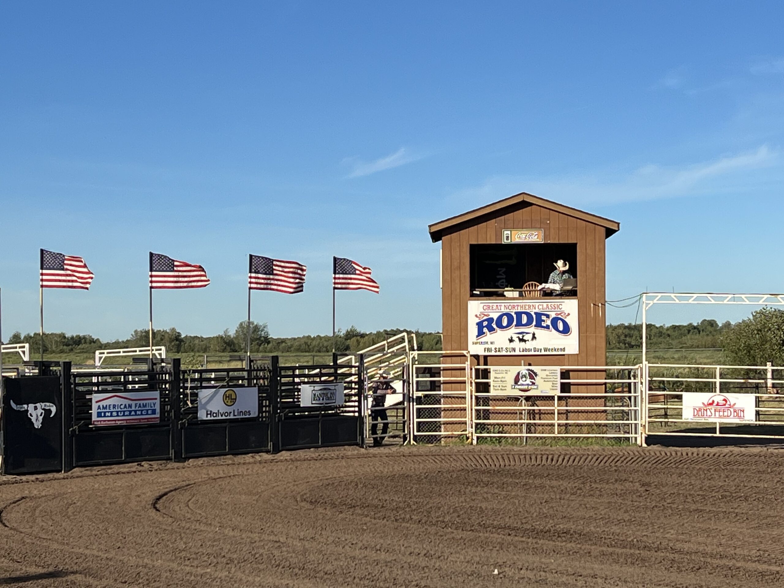 rodeo sign next to American flags