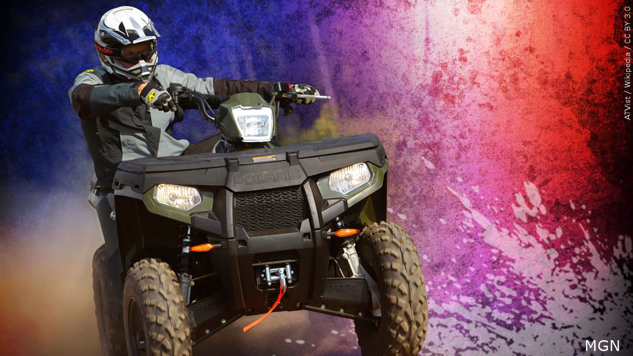 graphic of person on ATV with emergency lights behind