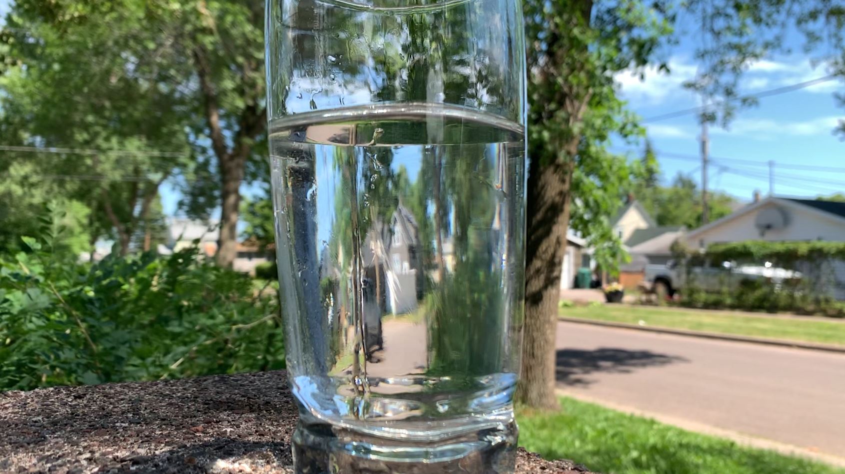 water in clear glass