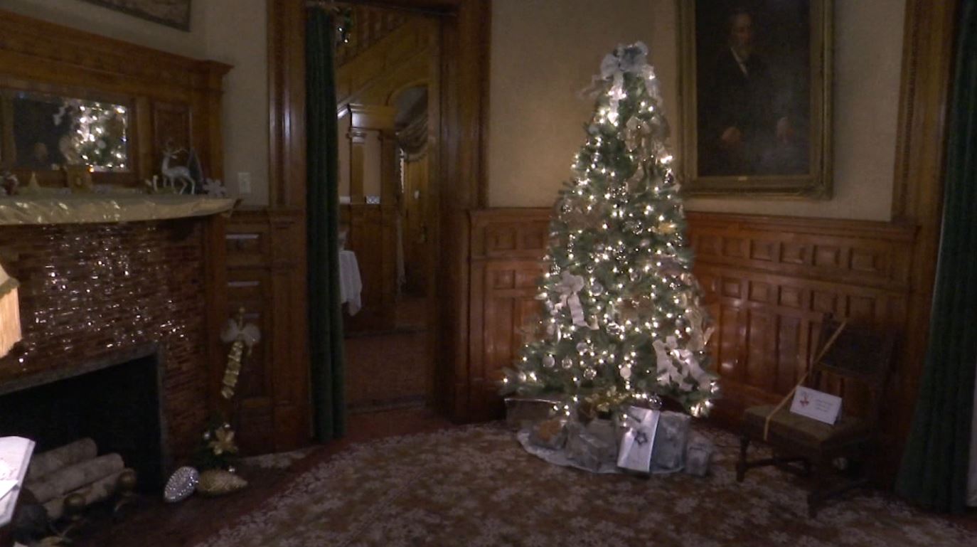 A tree is lit inside the Fairlawn Mansion
