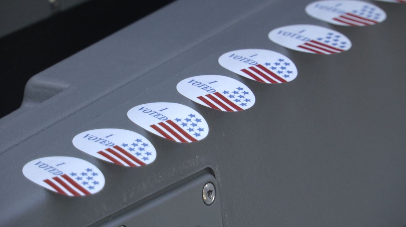 "I Voted" stickers on a Wisconsin ballot machine