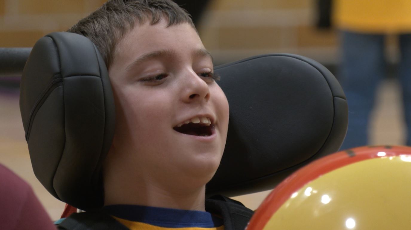 A Lester Park Elementary student does adapted bowling