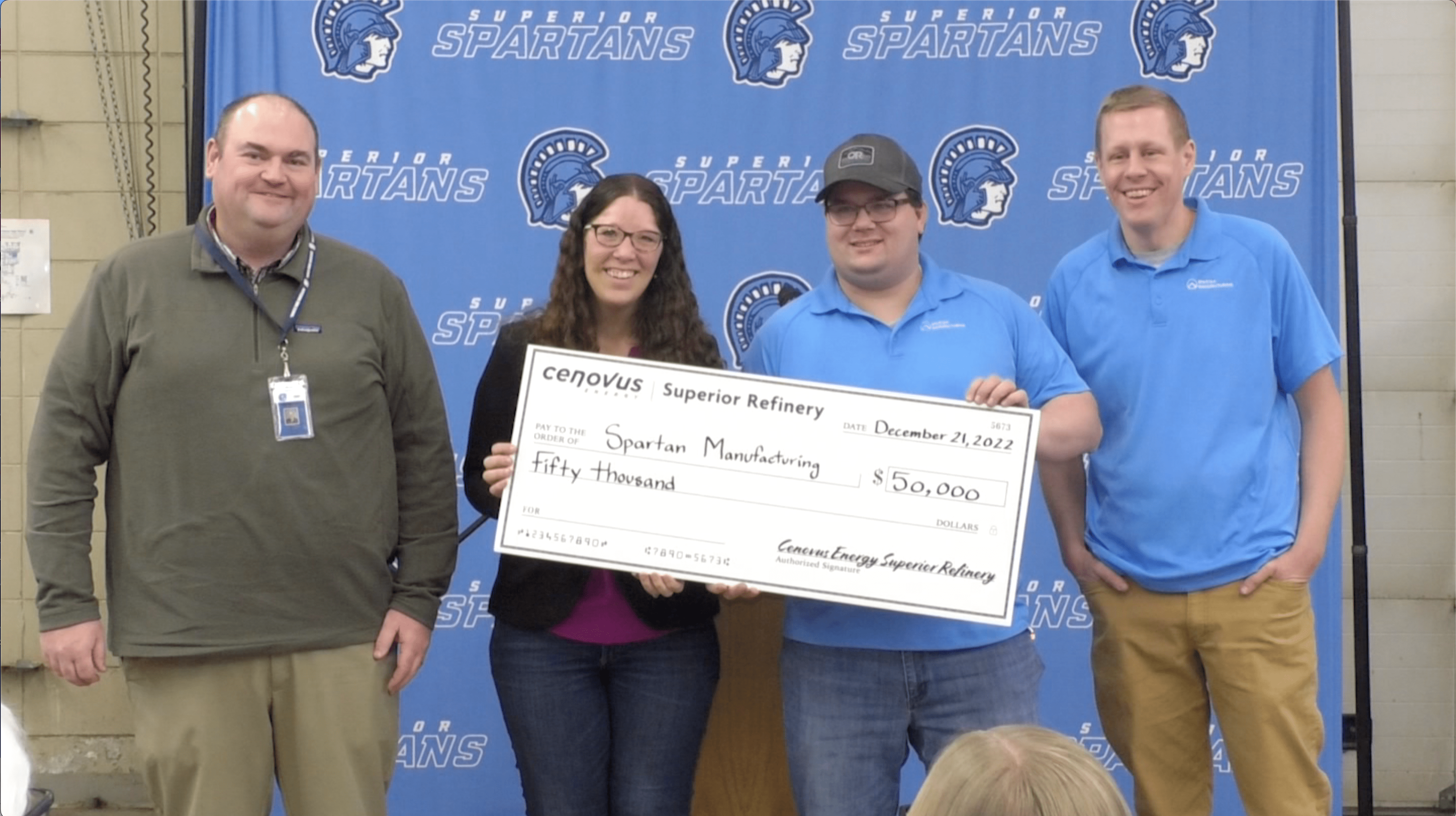 Superior High School gets a check from Cenovus Superior Refinery