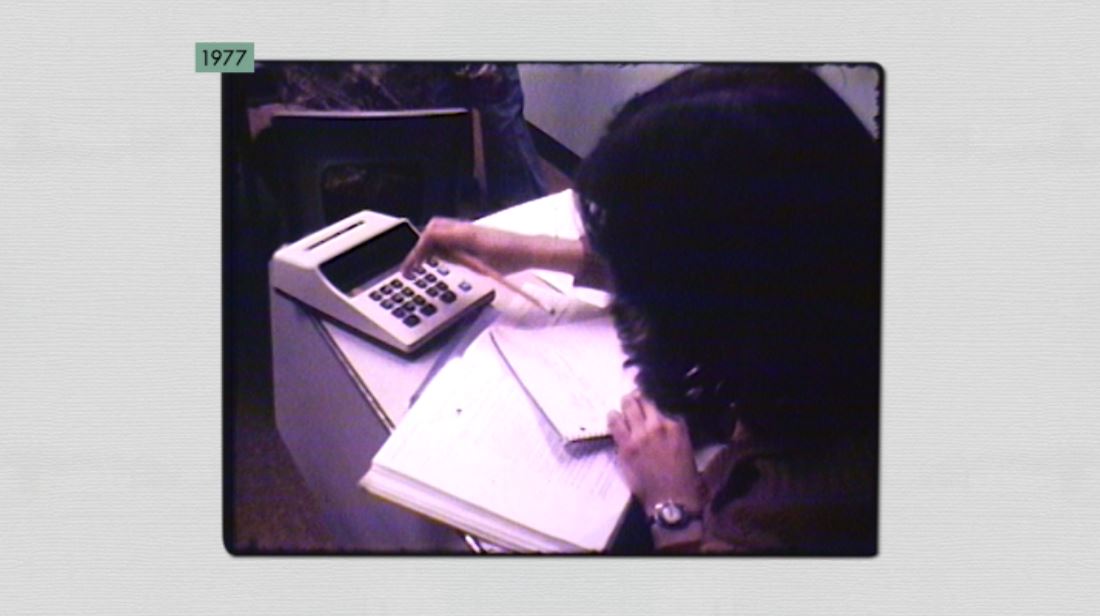 A student using a calculator in 1977