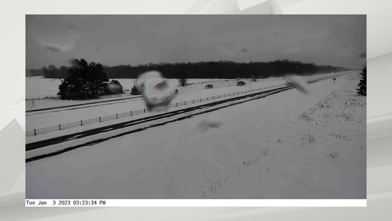 MnDOT camera view of snow covered I-35 near Rush City in Pine County.