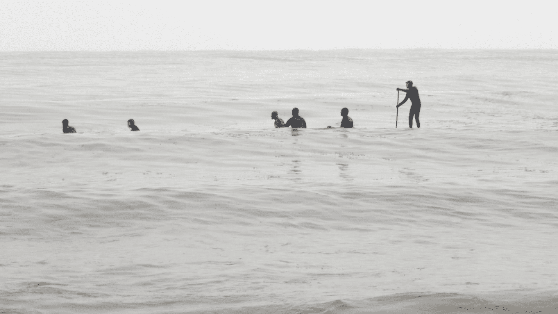 photo of surfers on Lake Superior