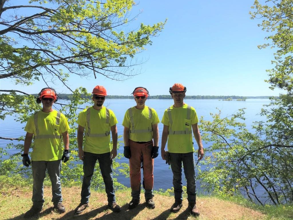 A crew of park workers pose for a photo along the Willow Flowage in Oneida County.