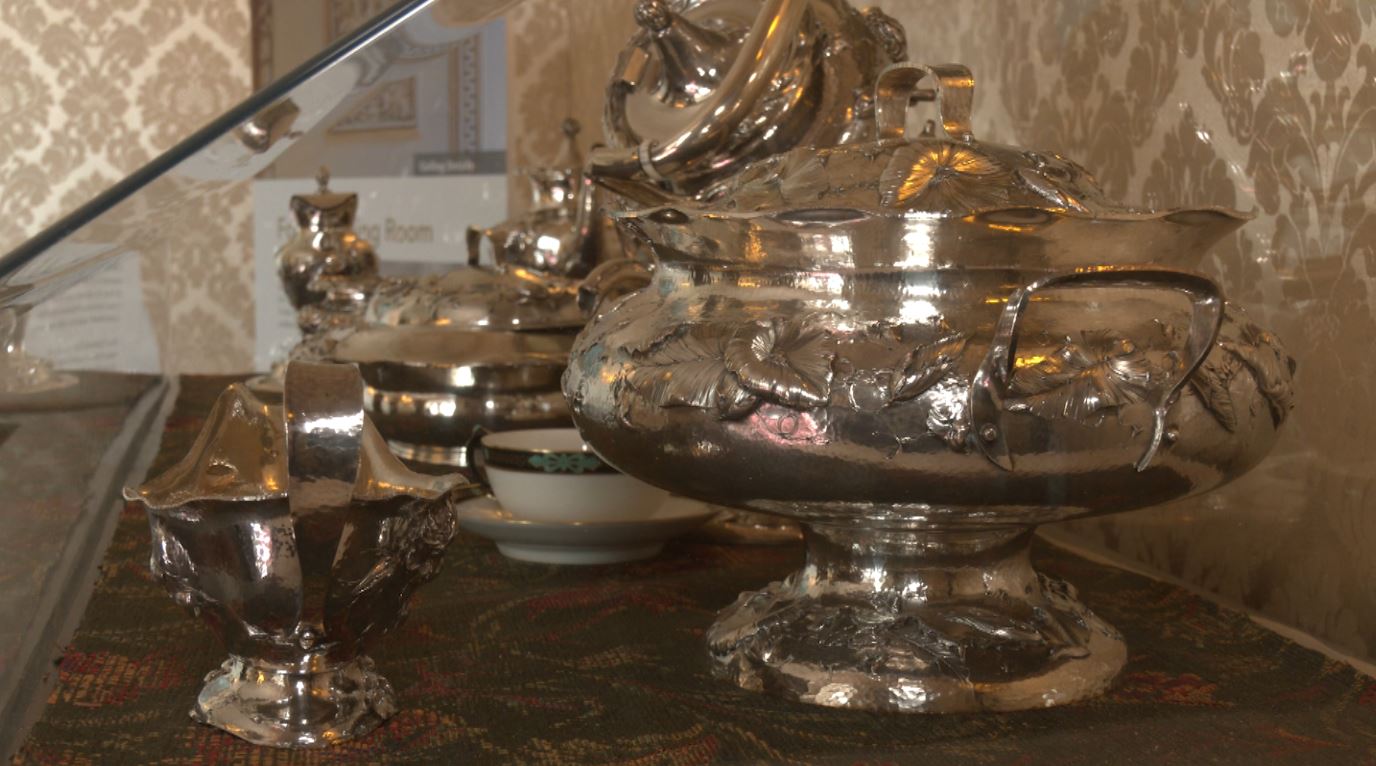Some silver serving pieces on display in the Glensheen Mansion