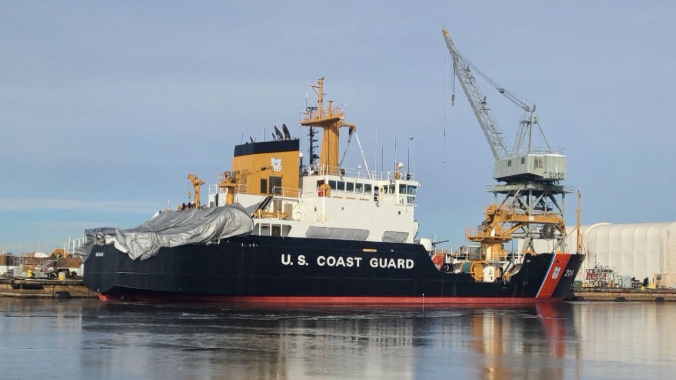 U.S. Coast Guard Cutter SPAR docked in water