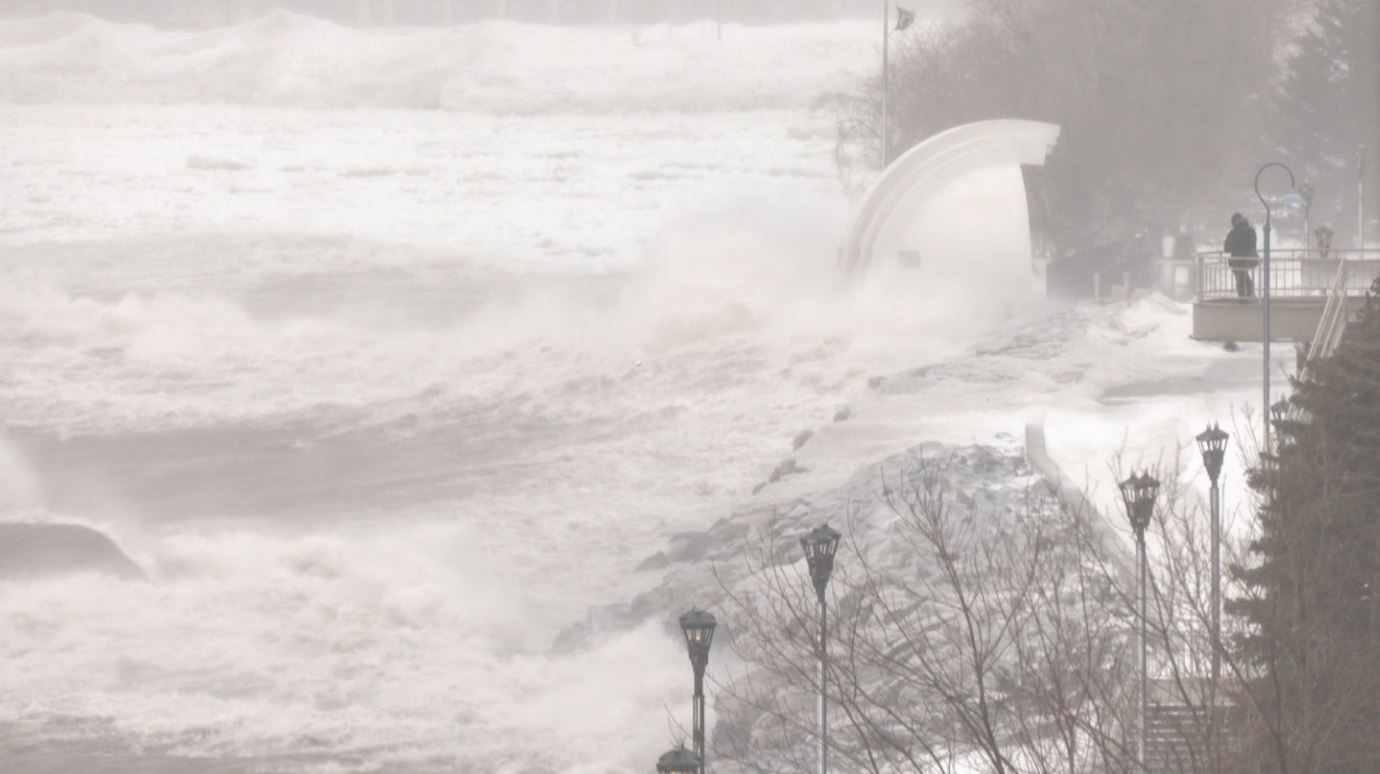 Waves crash into the shore along Duluth's Lakewalk