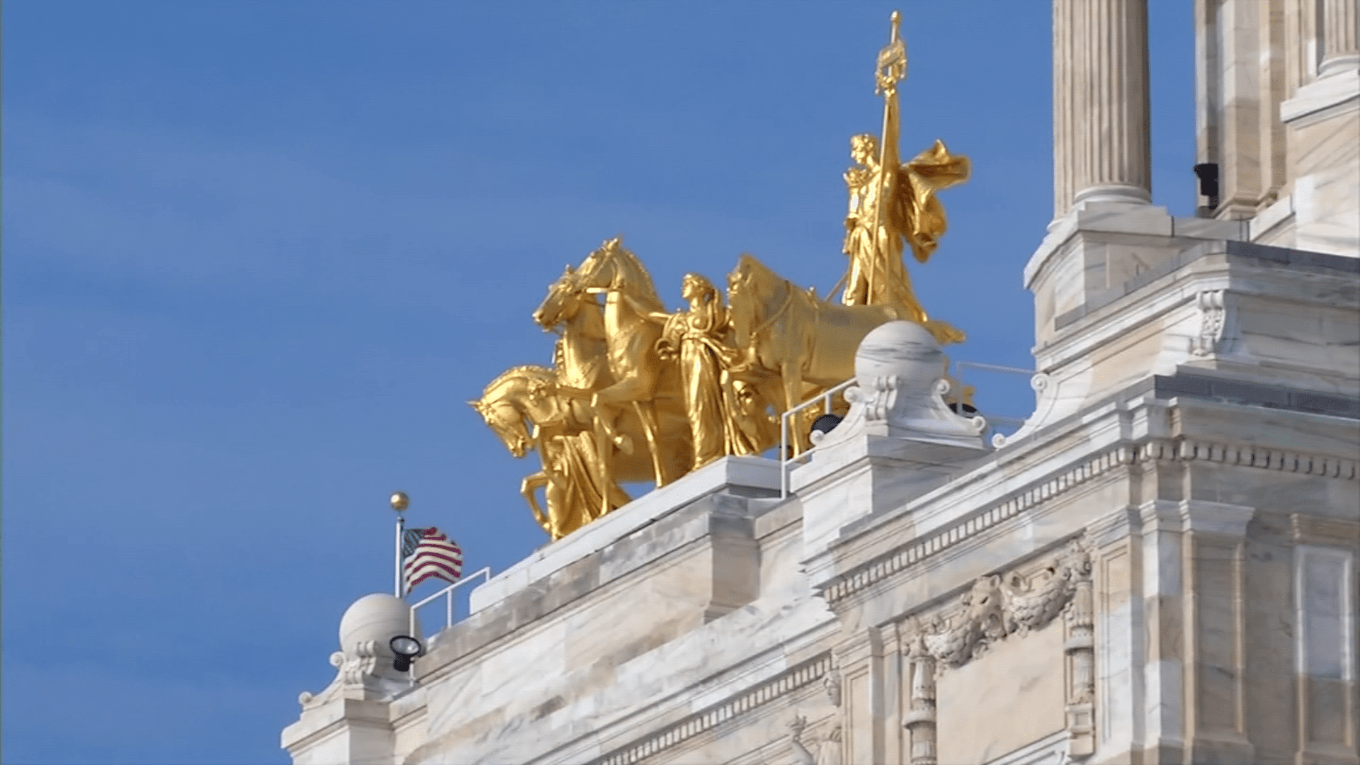 Gold statues on the MN capital building.
