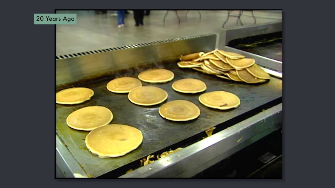 Pancakes on the griddle at Pancake Day 2003