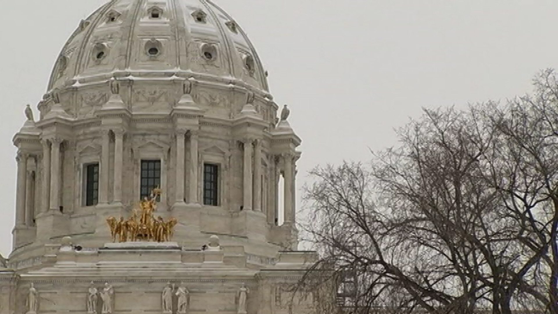 Winter view of the front of the Minnesota State Capitol dome.