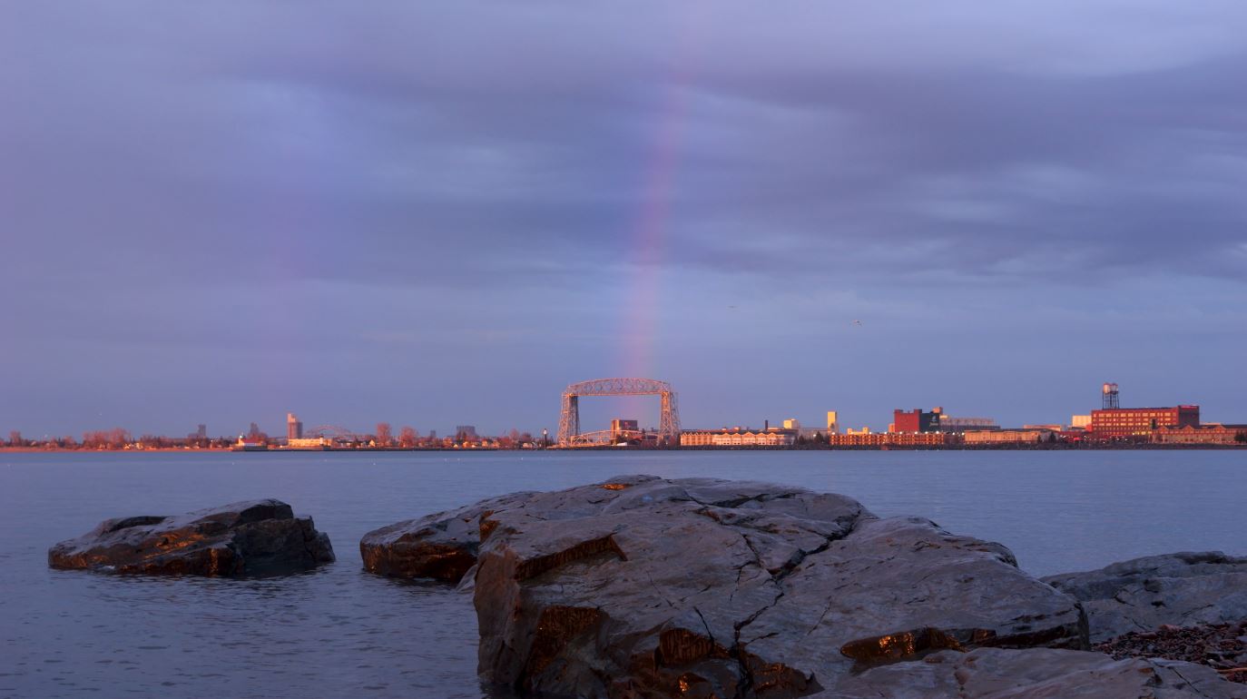 A rainbow hovers over Duluth's Aerial Lift Bridge