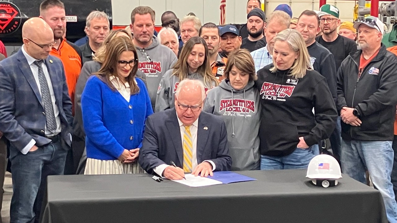 Walz signs refinery safety bill at St. Paul Pipefitters hall