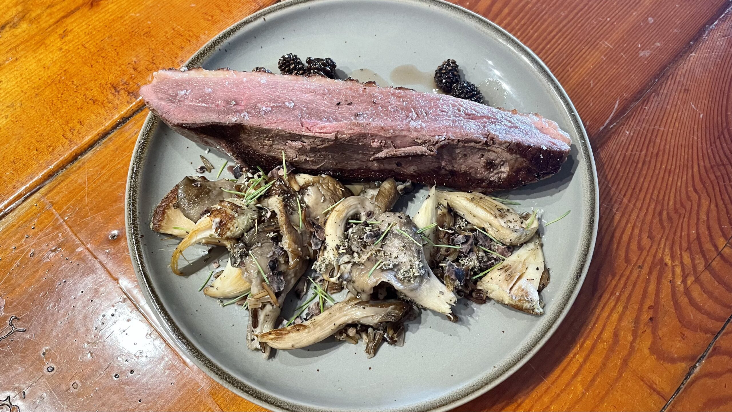 Duck with mushrooms, wild rice, and spring pinecone jam