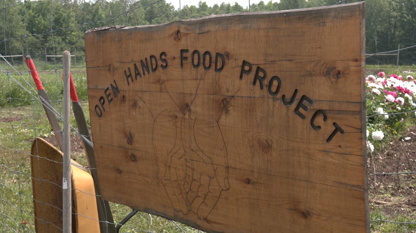 The "Open Hands Food Project" sign