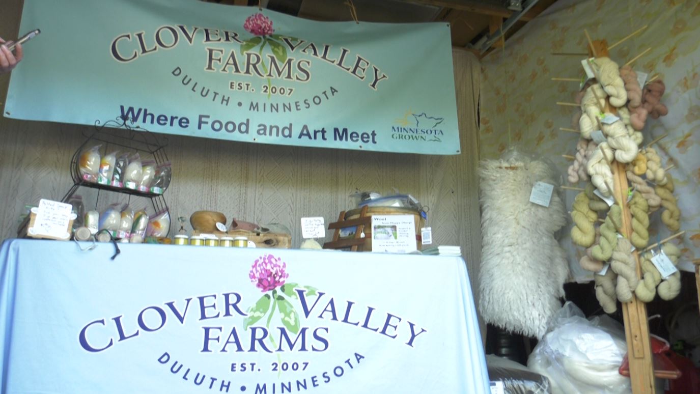 A Clover Valley Farm booth