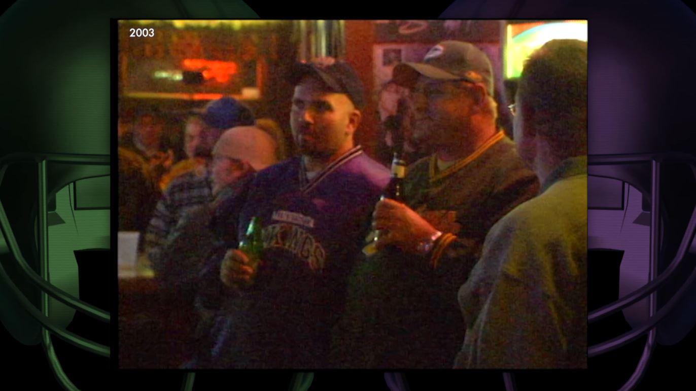 Vikings and Packers fans watch the Border Battle