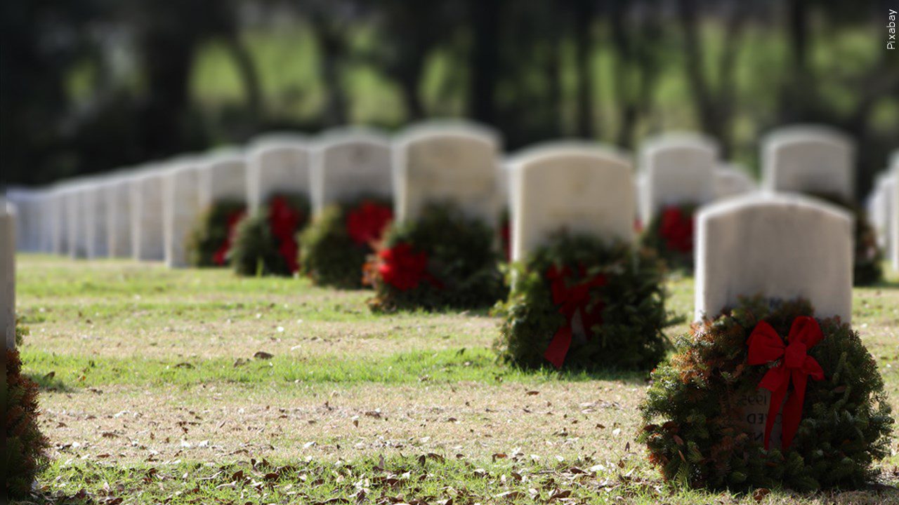 Wreaths in front of gravesites