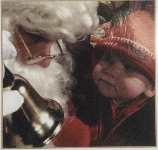 OLIP- Rick and Roberta Nurmi - granddaughter Everly meeting Santa for the first time