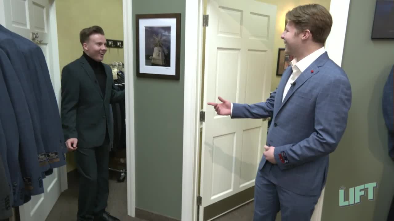 Kenny Johnson and Spencer Pierce try on suits at Mainstream Fashions for Men
