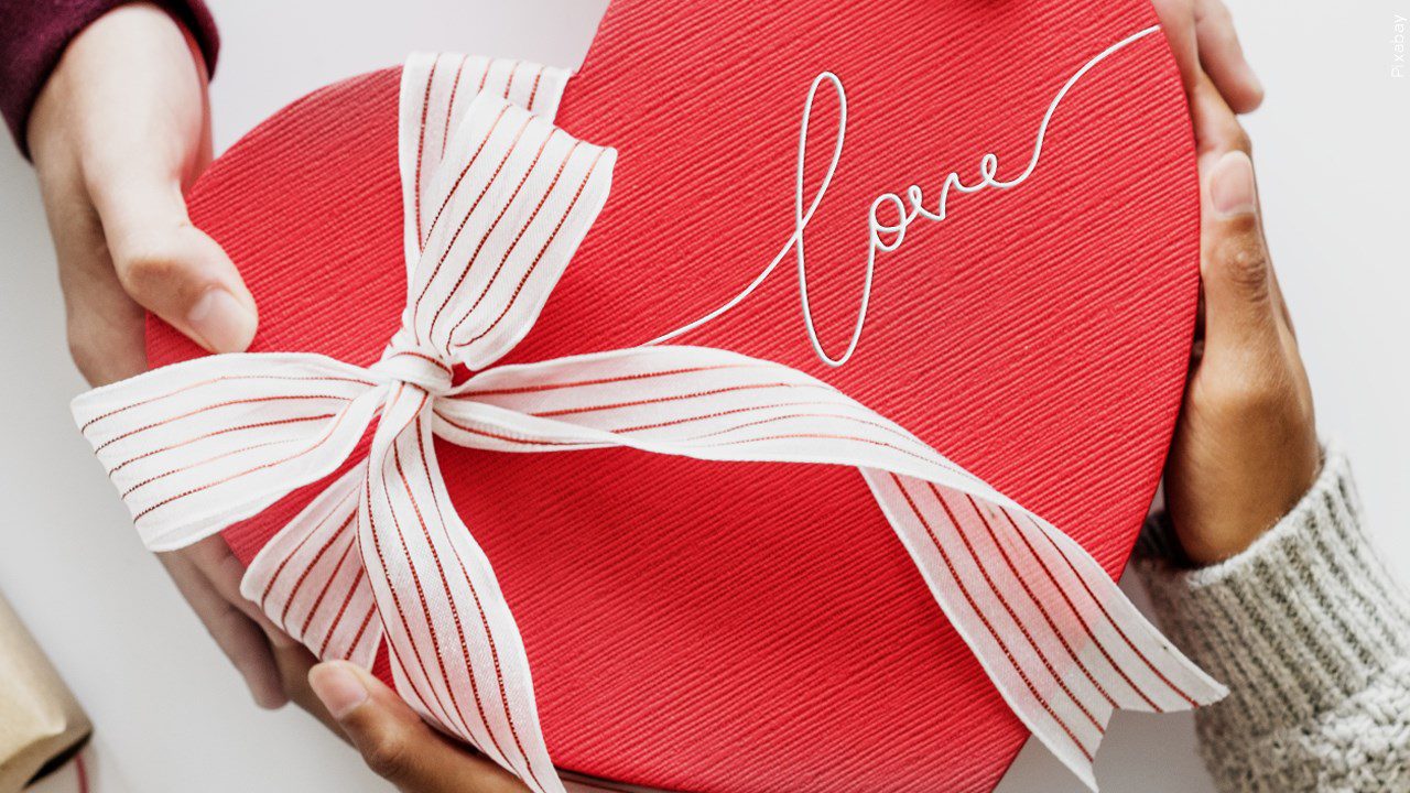 A heart-shaped red box that says "love."