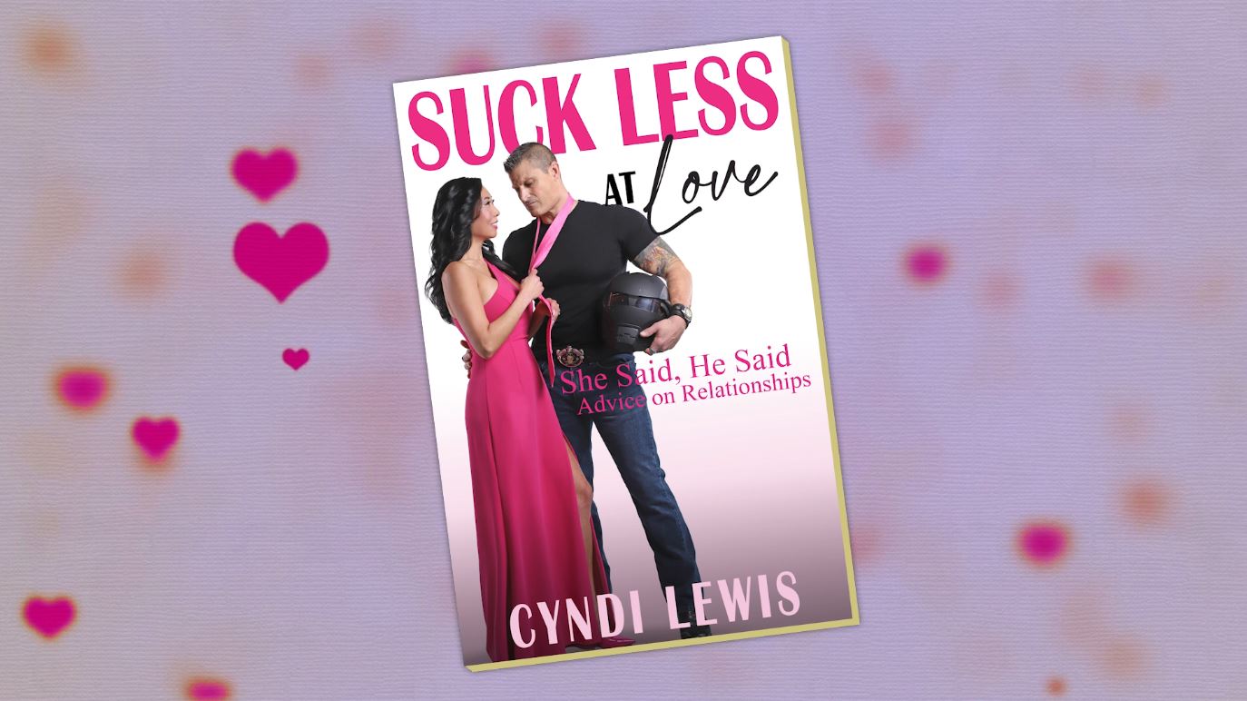 The cover of "Suck Less at Love"