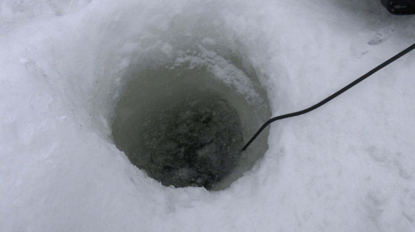 A hole in the ice for fishing