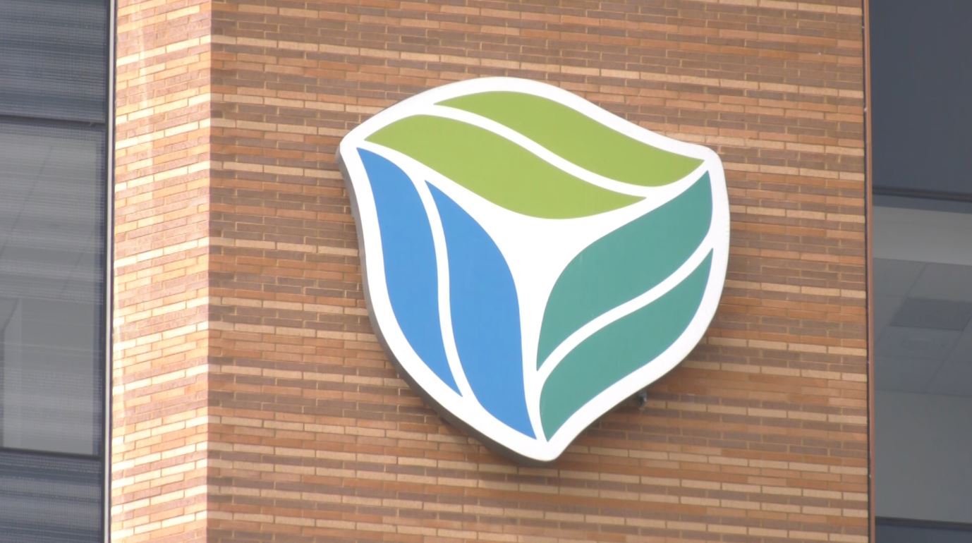 The Essentia logo on the side of a building