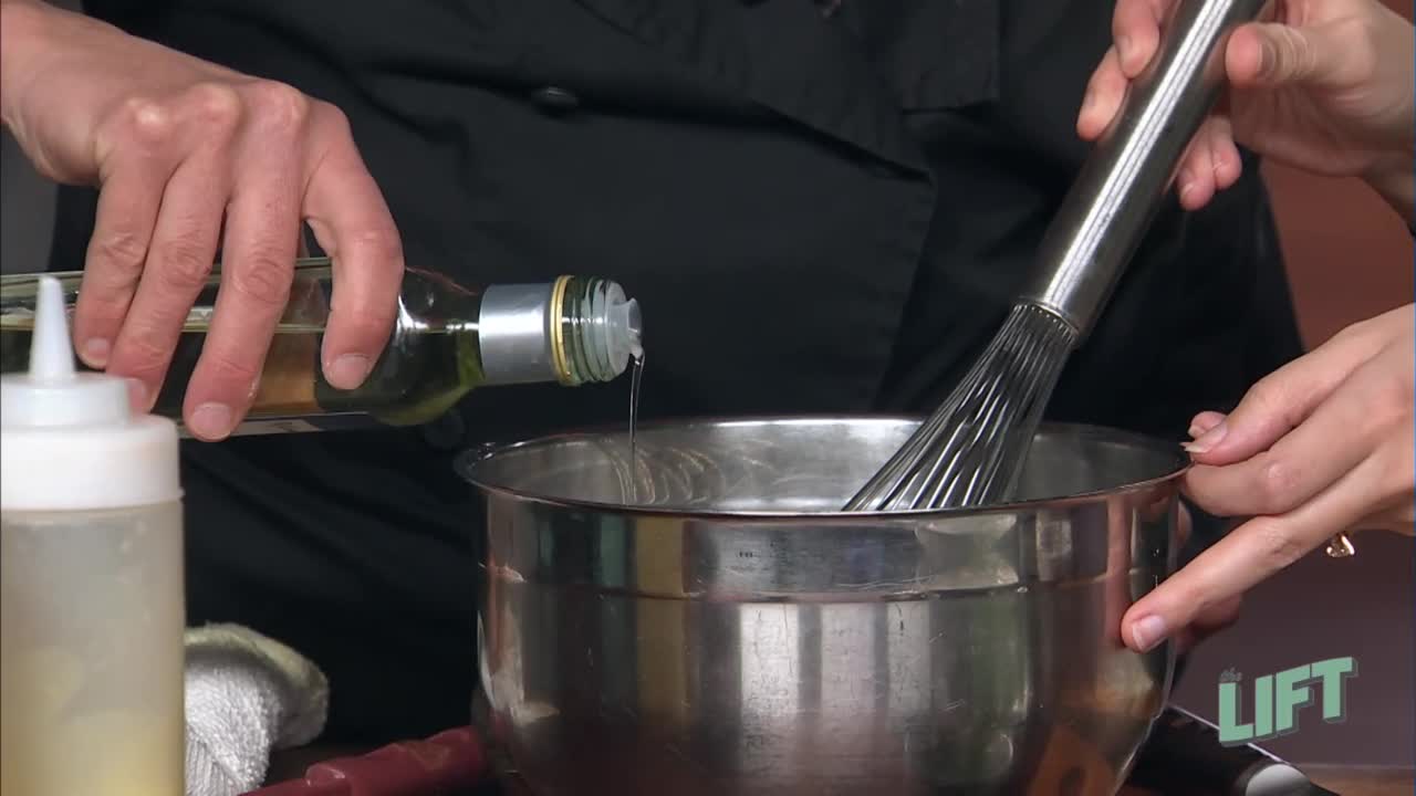 Truffle oil is poured into the French Toast batter