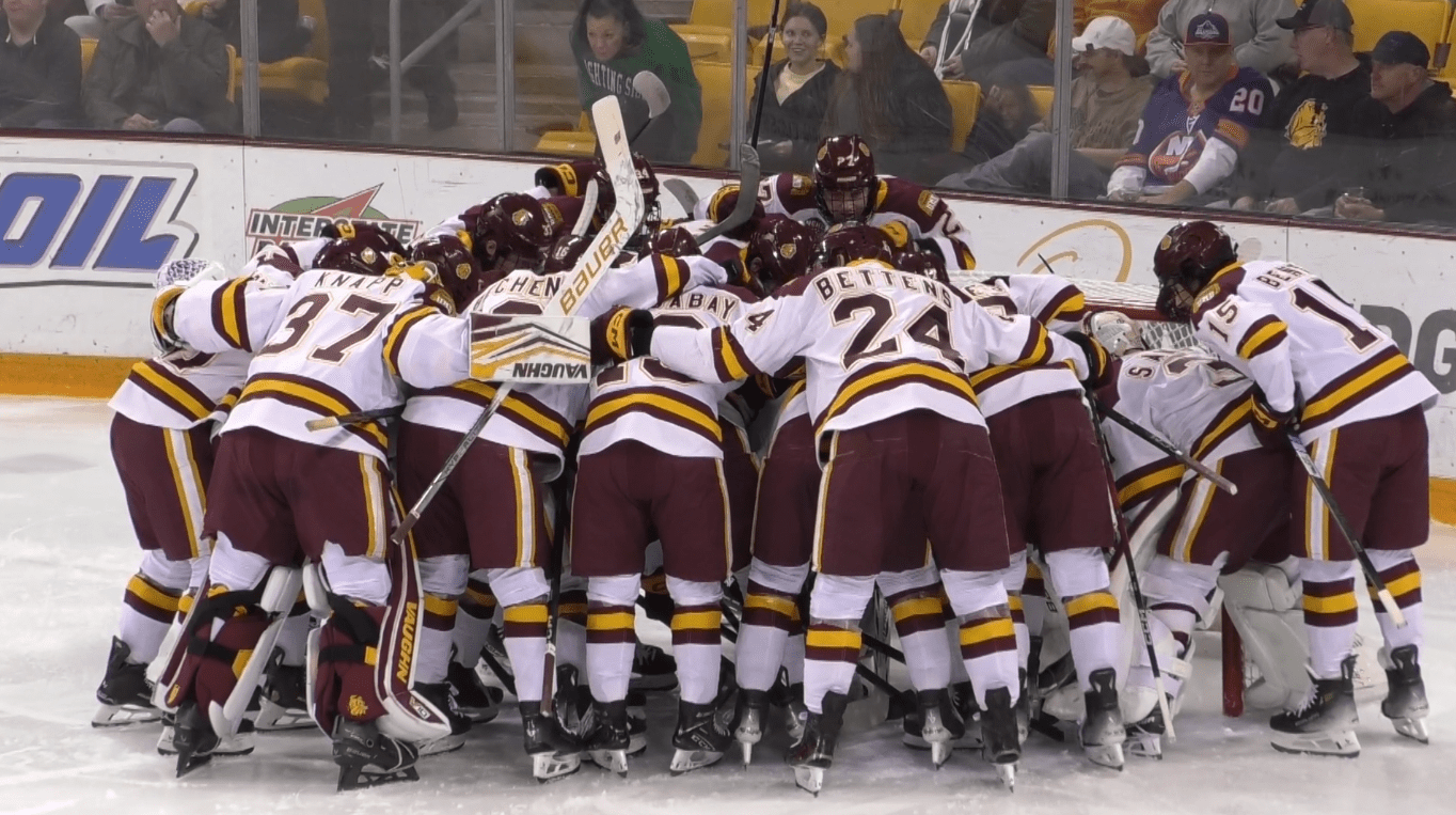 UMD men's hockey huddles against North Dakota.