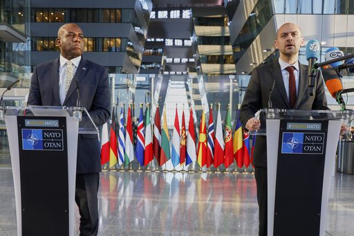 Britain's Foreign Secretary David Lammy, left, and French Foreign Minister Jean-Noel Barrot address the media during a meeting of NATO foreign ministers at NATO headquarters in Brussels, Friday, April 4, 2025. (AP Photo/Geert Vanden Wijngaert)